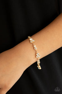 Social GLISTENING - Gold Paparazzi Gold Bracelet