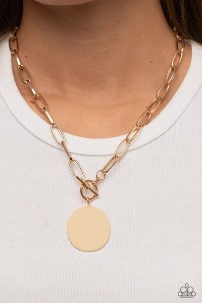 Tag Out - Gold Paparazzi Necklace