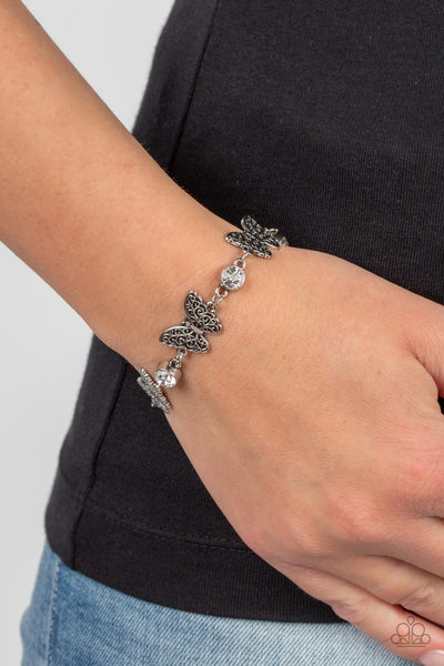 Has a WING to It - White Paparazzi Bracelet