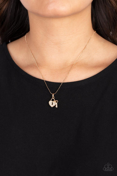 You Hold My Heart Gold Paparazzi Necklace